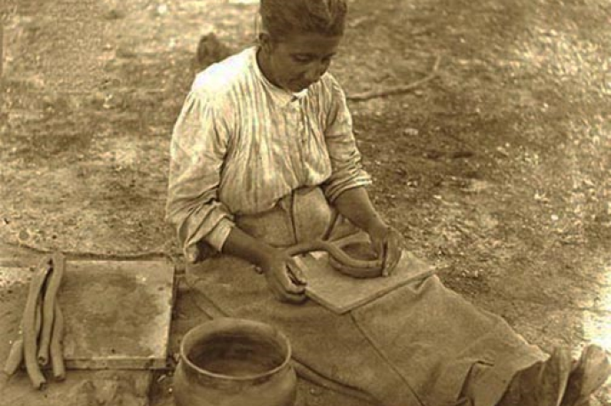 A Catawba potter. The Charlotte Mecklenburg Library's Robinson-Spangler Carolina Room looks at the history of Native Americans in North Carolina.