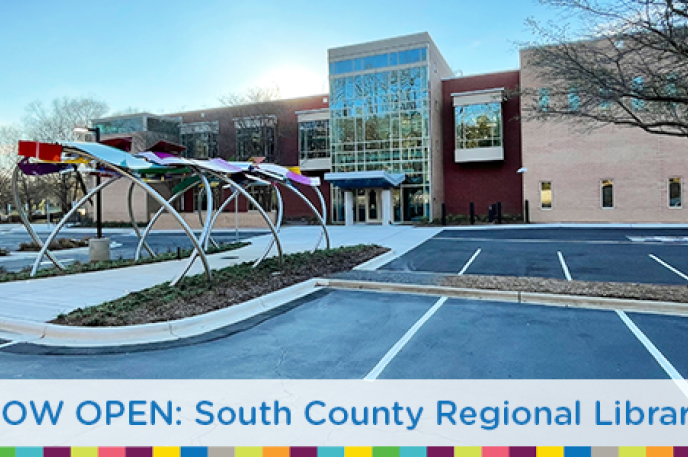 A view of the "Open Book, Open Minds" public art and entrance at Charlotte Mecklenburg Library's  South County Regional Library branch.