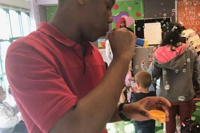 David Clinkscales volunteering at storytime