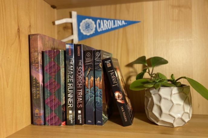 Books on a shelf.  Photo by Emily Pack of "The Daily Tar Heel."