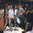 Photo of Martin Luther King, Jr.  surrounded by media in 1962. Photo courtesy of Getty Images/Ernst Haas.